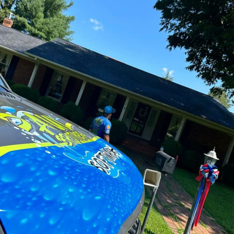 Professional roof cleaners delivering cleaning service to residential area in burlington north carolina