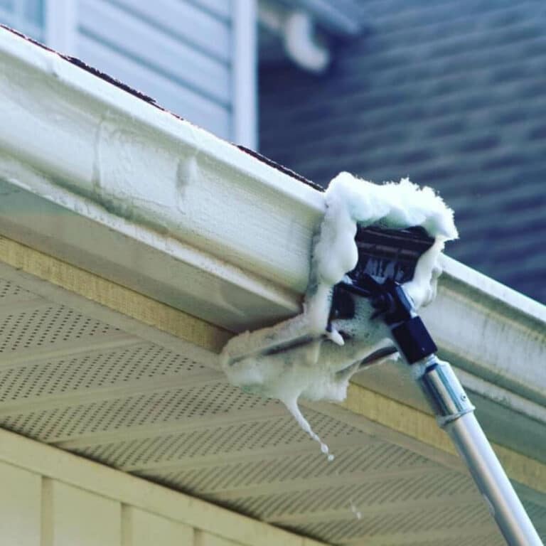 professional contractor cleaning gutter in asheboro north carolina