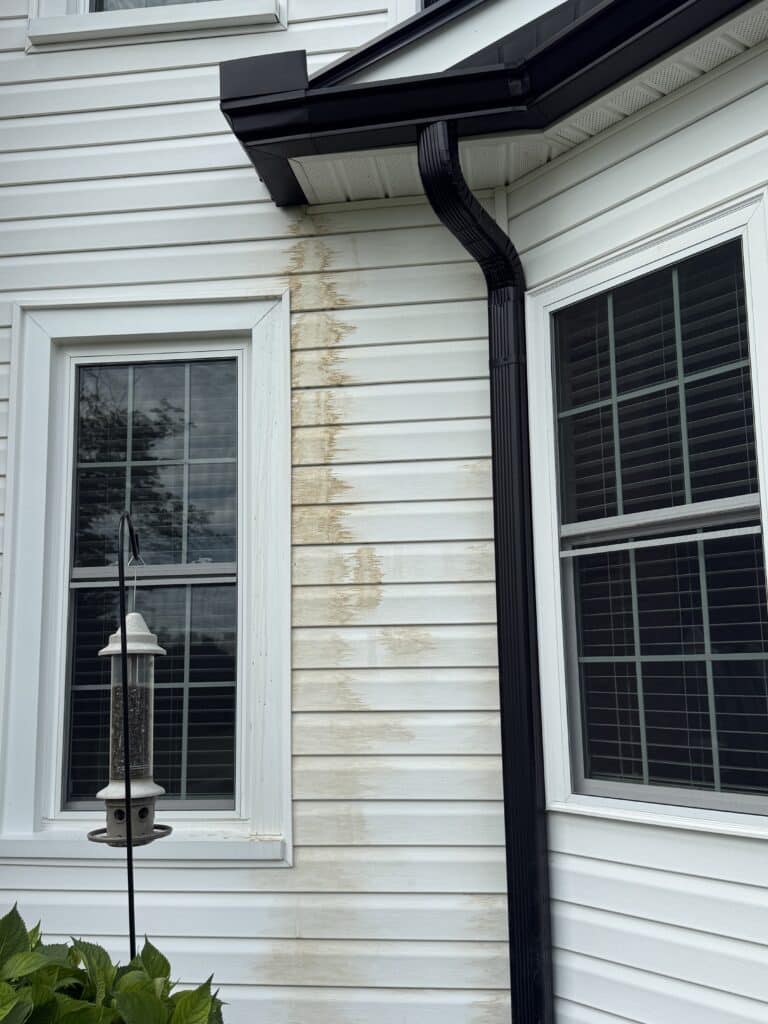 Dirty runoff streaks after house washing