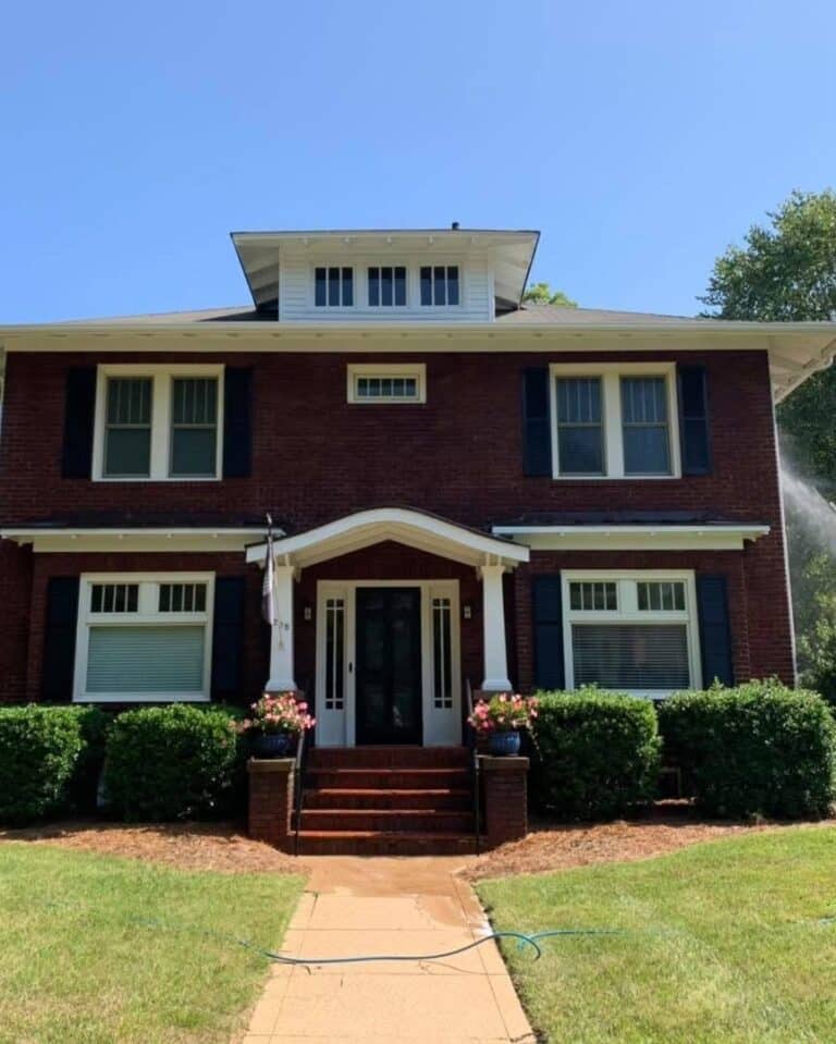 Professional house washing on a home in Summerfield NC using the softwashing method